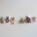 Two powder pink flower clips for communion