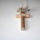 Natural wooden cross with flowers