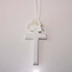 Ivory wooden cross with flowers