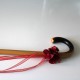 Burgundy wooden cane