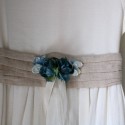 Blue flowers in a small belt