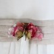 Pink flowers in a small belt