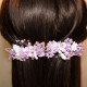 Two mauve flower clips for invited girl and wedding