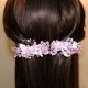 Two mauve flower clips for invited girl and wedding