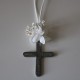 Metal silver cross with white flowers