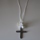 Metal silver cross with white flowers