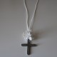 Metal silver cross with white flowers