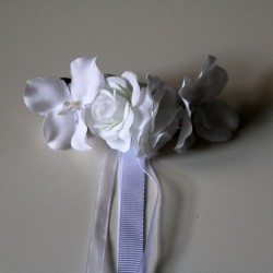 White flower barrette.