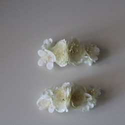 Two maril and camel flower clips for communion